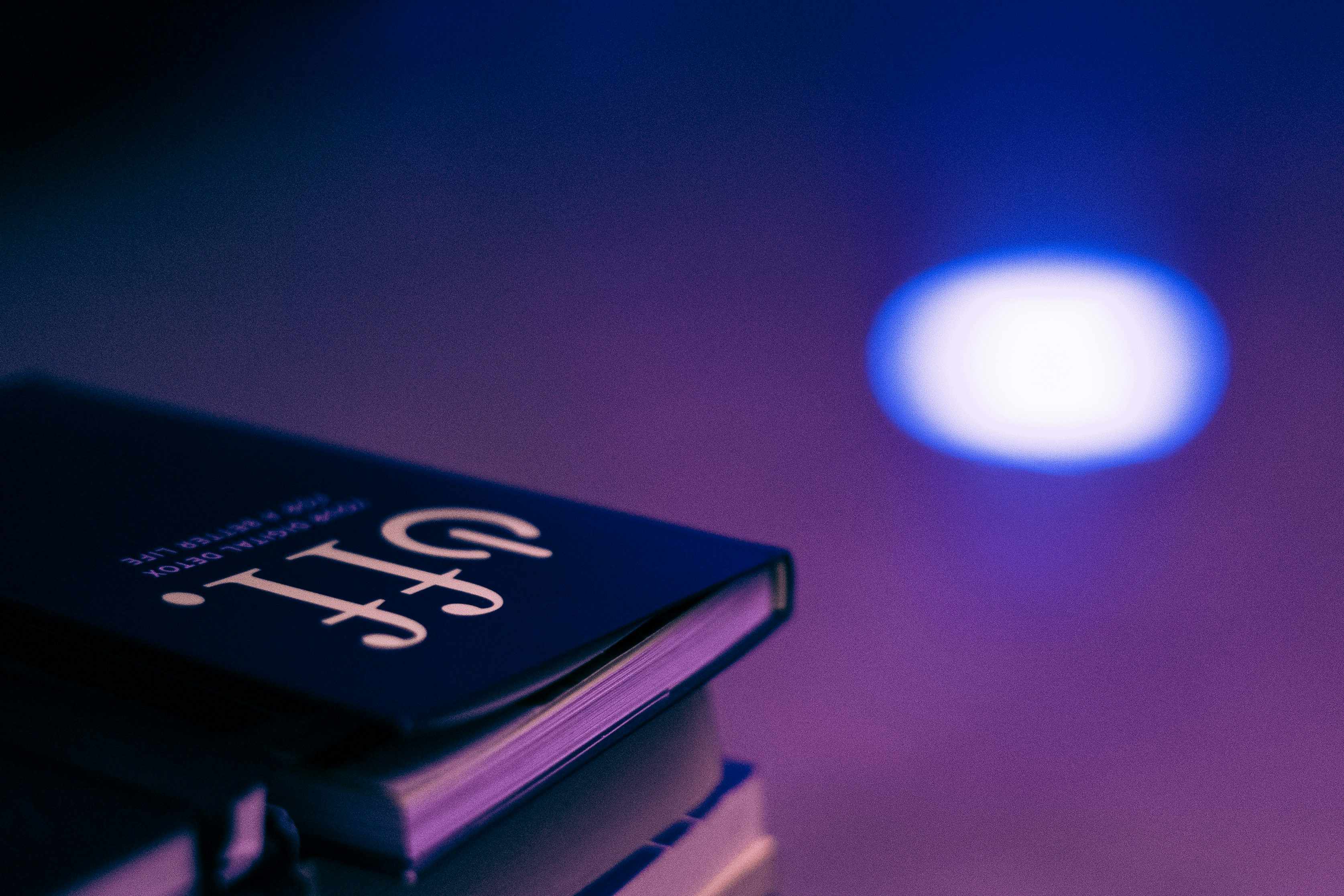 Professional book with atmospheric purple lighting